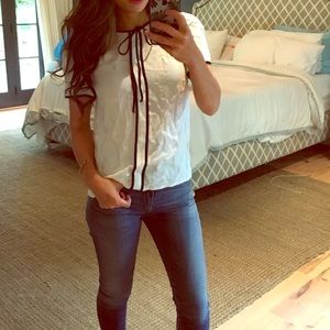 Blouse top with front tie bow